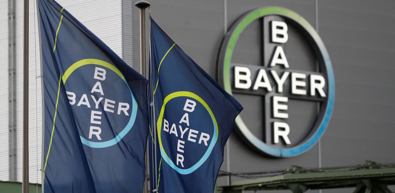 Logo and flags of Bayer AG are pictured outside a plant in Germany. Credits: Reuters