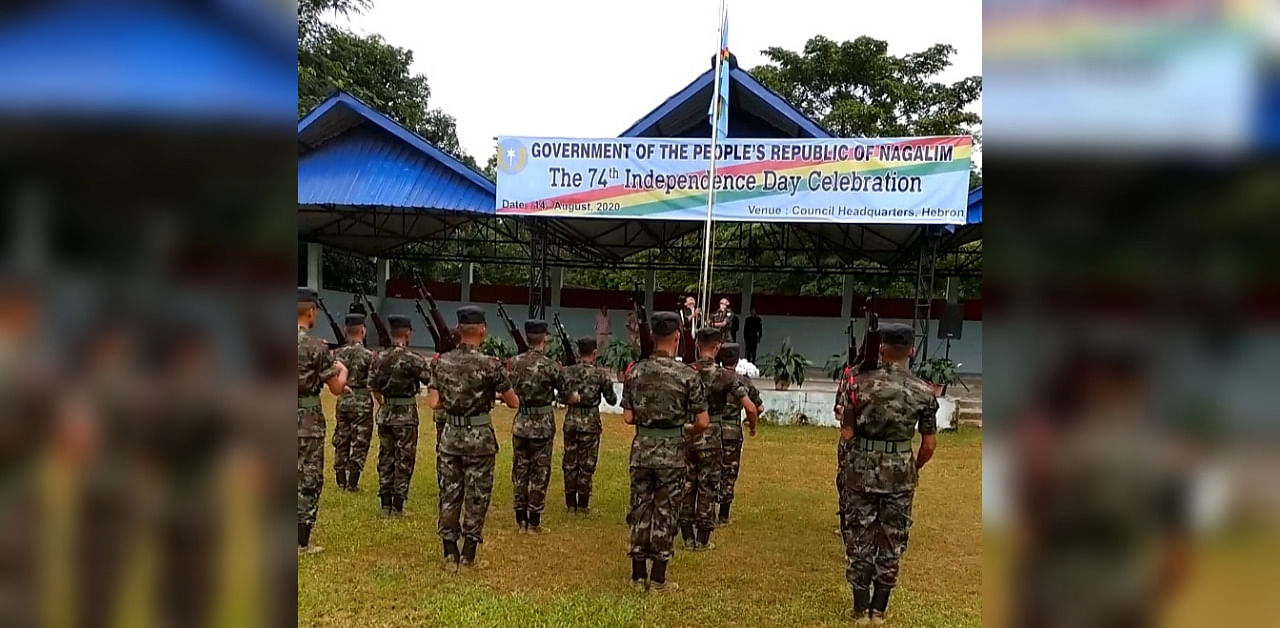 NSCN (IM) members hoisting 'Naga National Flag' at camp Hebron in Nagaland to celebrate their 'Independence Day'. Credit: DH Photo