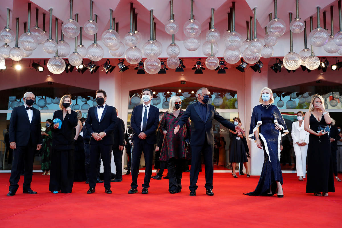 Director of the 77th Venice International Film Festival, Alberto Barbera poses with President of the jury Cate Blanchett and Member of the jury Ludivine Sagnier of France. Credit: Reuters