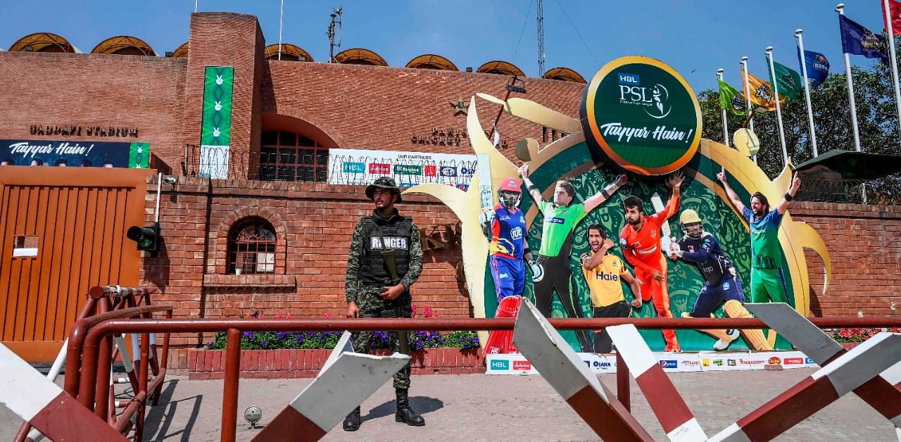 A soldier stands guard outside the Gaddafi Cricket Stadium in Lahore on March 17, 2020. Credit: AFP Photo
