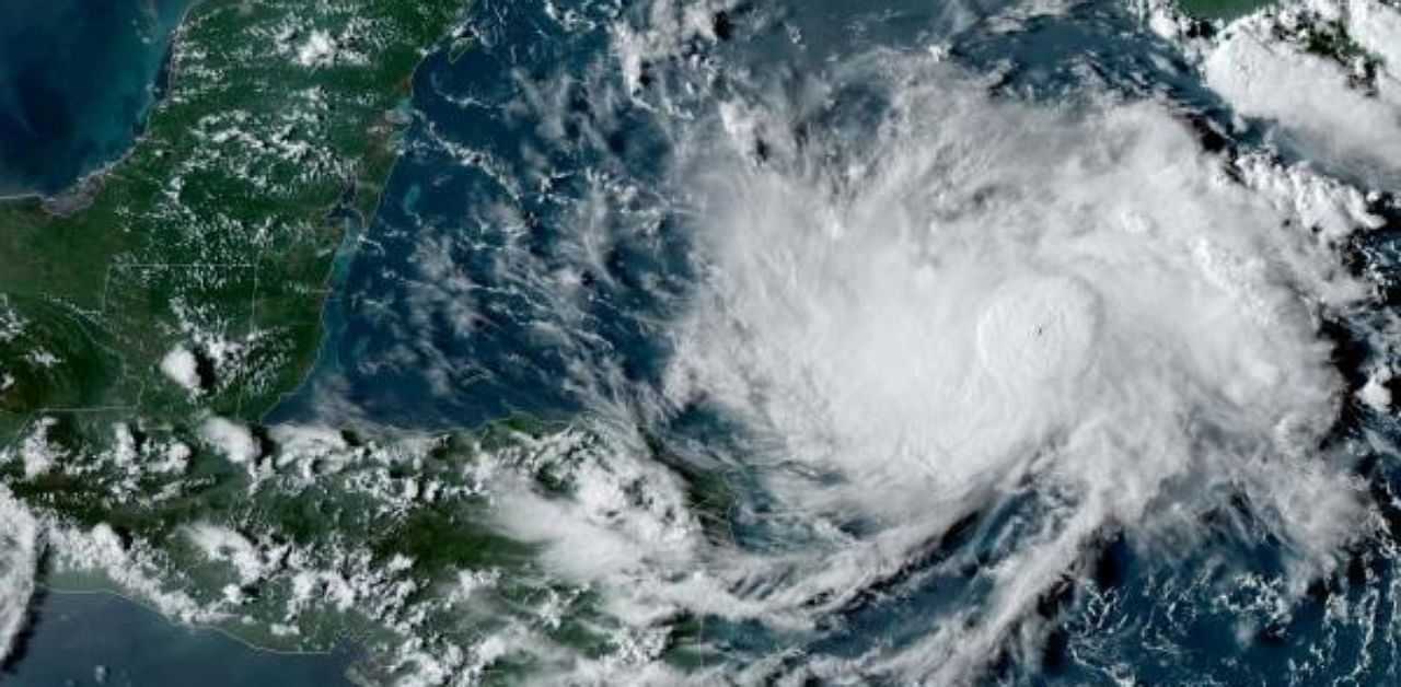 This satellite image shows Tropical Storm Nana (R) in the Caribbean at 22:00UTC, on September 1, 2020. Credit: AFP Photo
