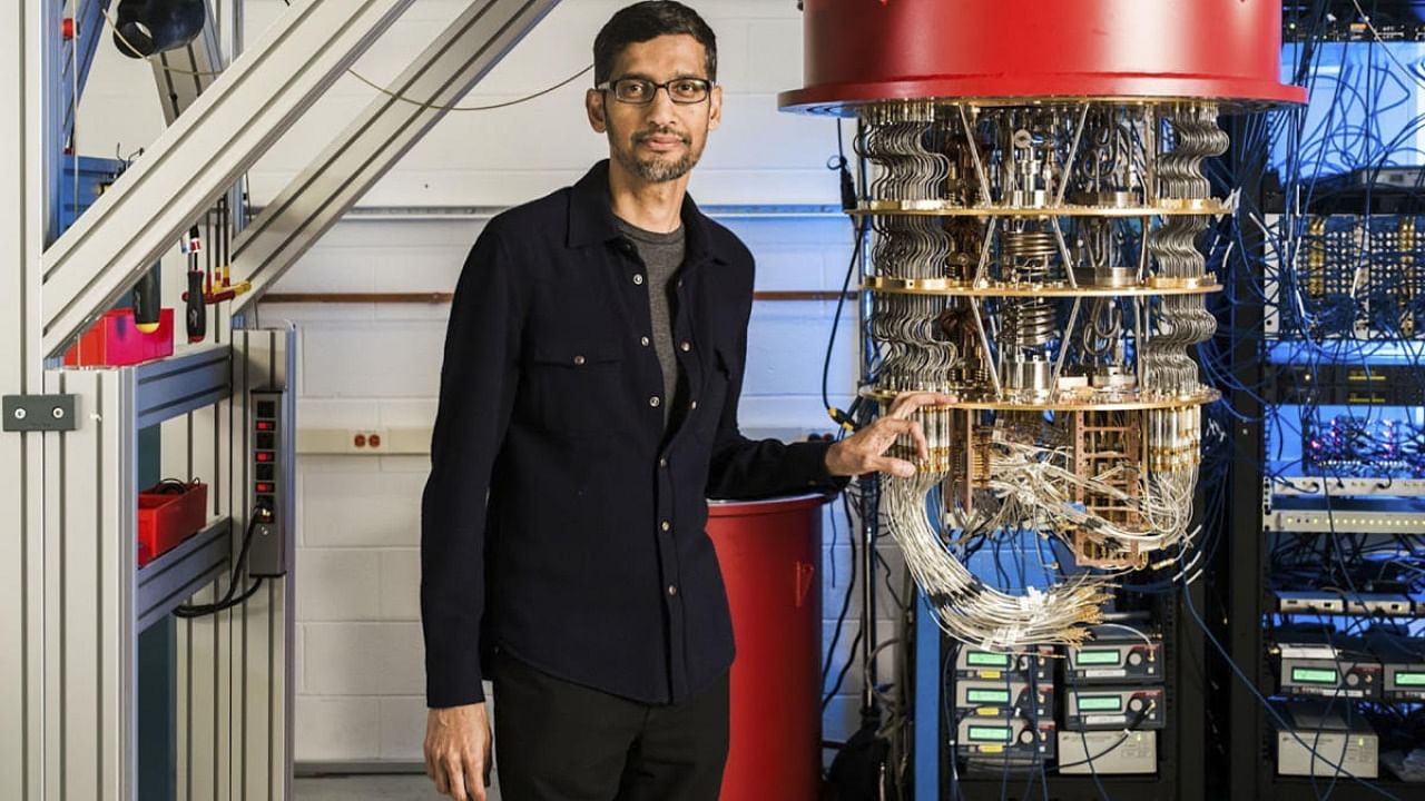 This undated handout image obtained October 23, 2019 courtesy of Google shows Sundar Pichai with one of Google's quantum computers in the Santa Barbara lab. Credit: AFP