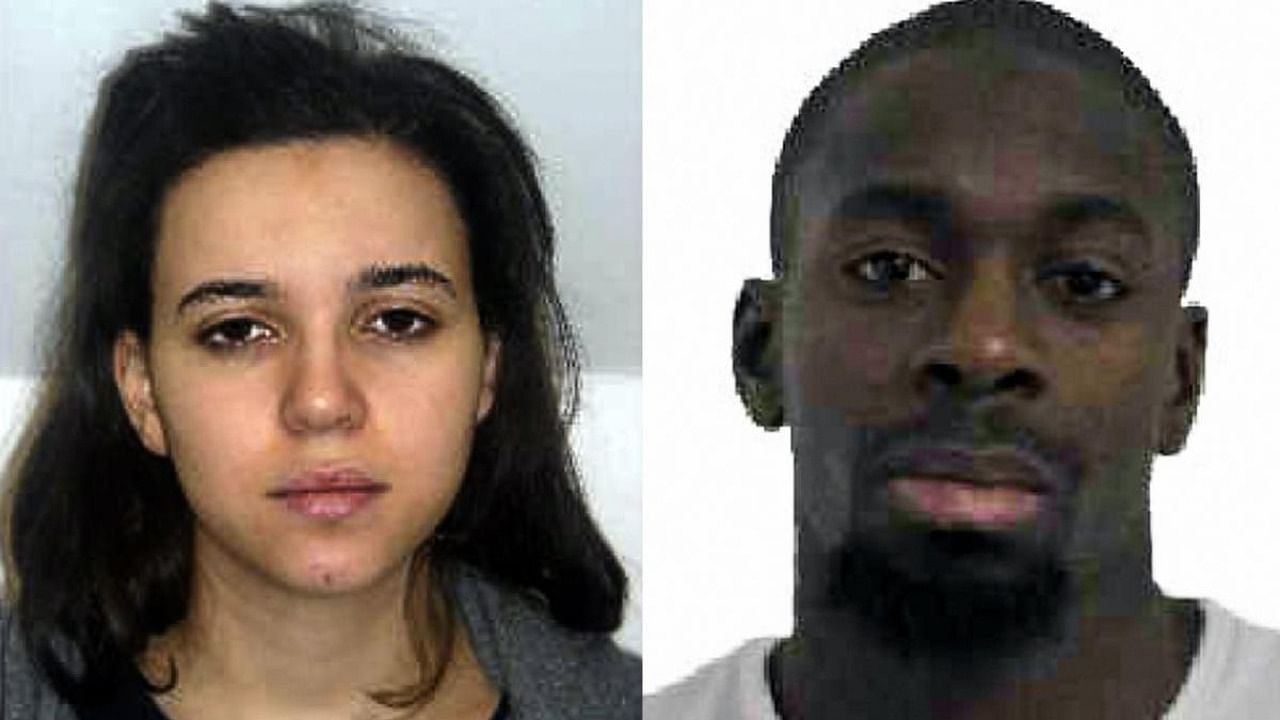 This file combination of images released on January 9, 2015 by the French police shows Hayat Boumeddiene (L) and Amedy Coulibaly (R), suspected of being involved in the killing of a policewoman in Montrouge on January 8, 2015. Credit: AFP/French Police