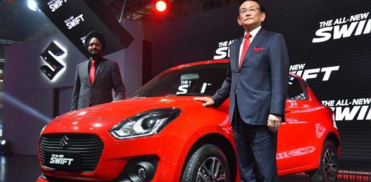 Maruti Suzuki's Managing Director & CEO and President of Society of Indian Automobile Manufacturers (SIAM) Kenichi Ayukawa (R). Credit: PTI Photo
