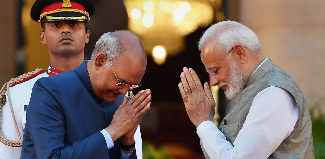 President Ram Nath Kovind greets Prime Minister Narendra Modi. Credits: PTI