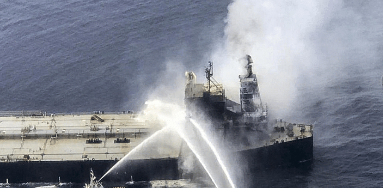  This handout photograph taken on September 4, 2020, and released by Sri Lanka's Air Force shows fireboats battling to extinguish a fire on the Panamanian-registered crude oil tanker New Diamond, some 60 kms off Sri Lanka's eastern coast where a fire was reported inside the engine room. redit: AFP Photo
