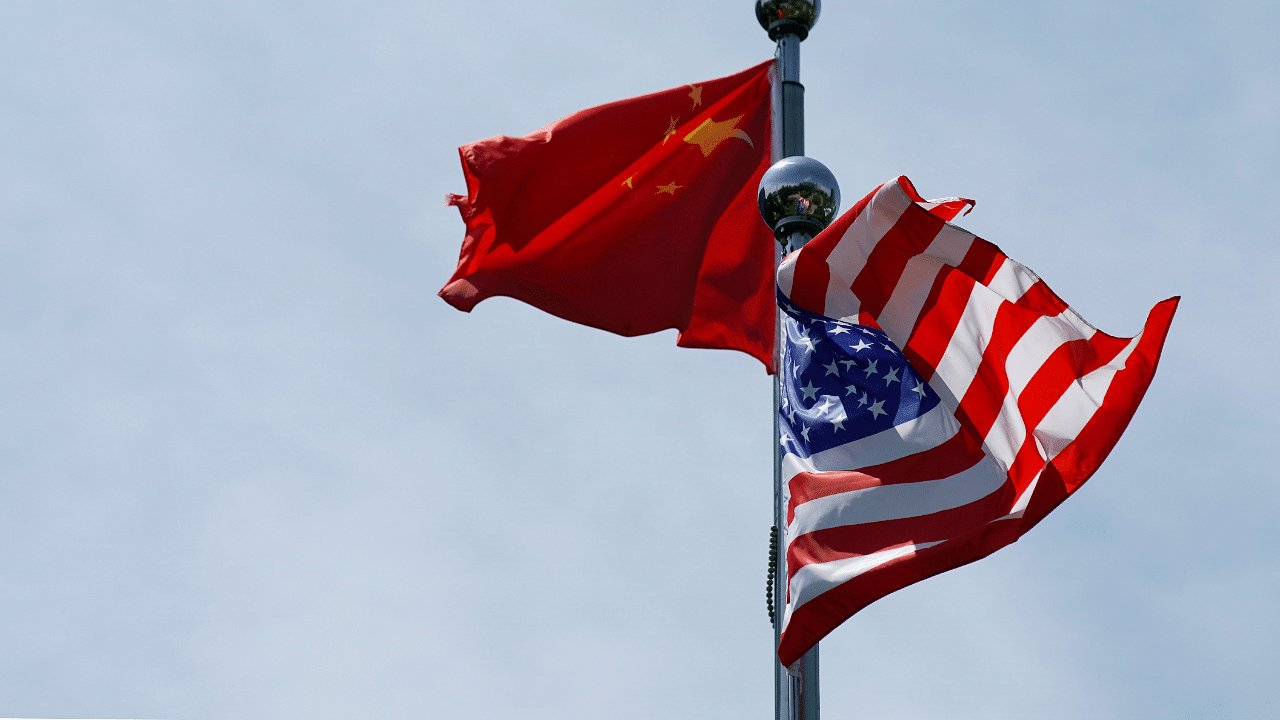 Chinese and US flags. Credits: Reuters Photo