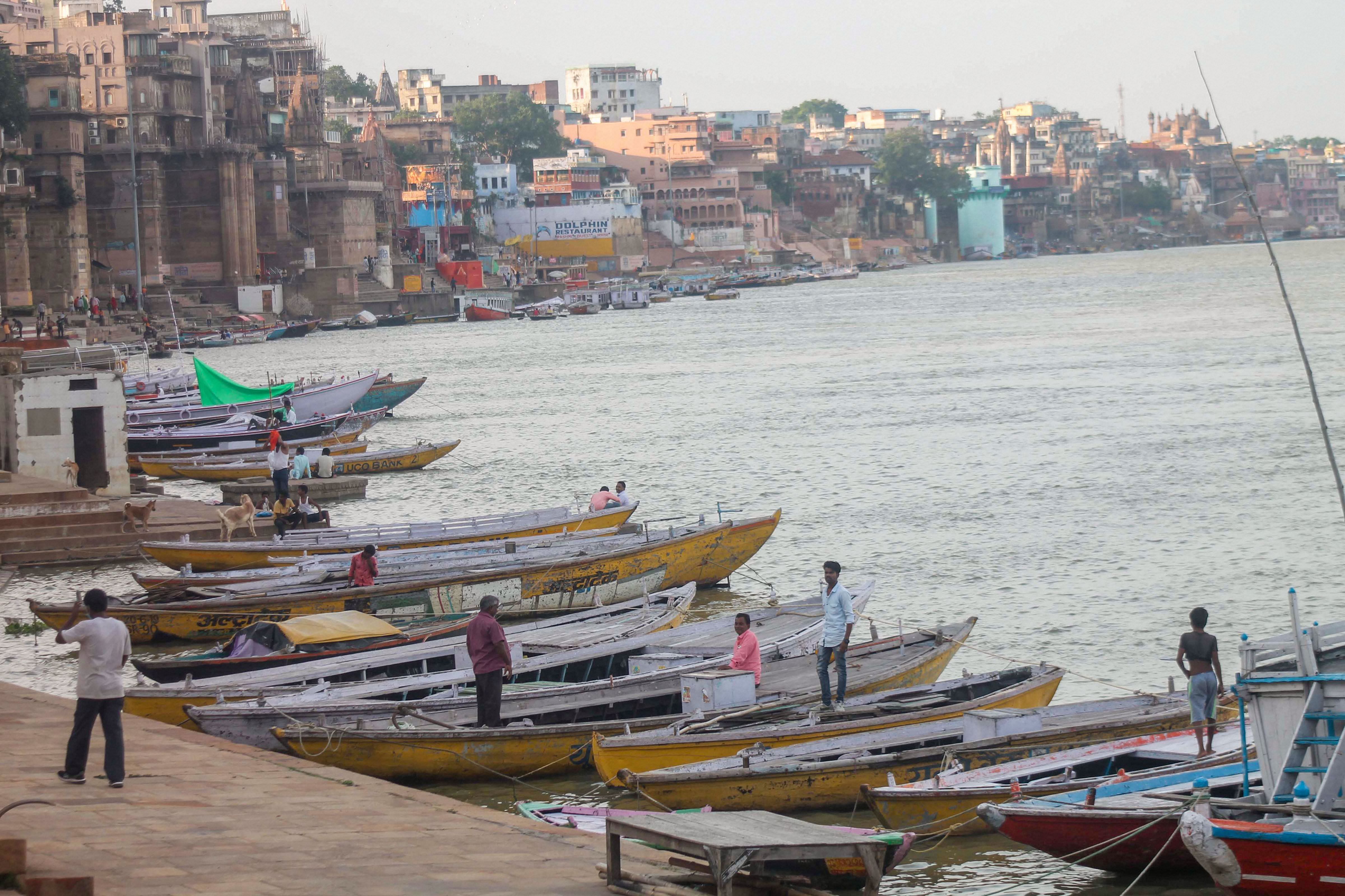 Boats anchored at a Ganga ghat in Varanasi. Credit: PTI Photo