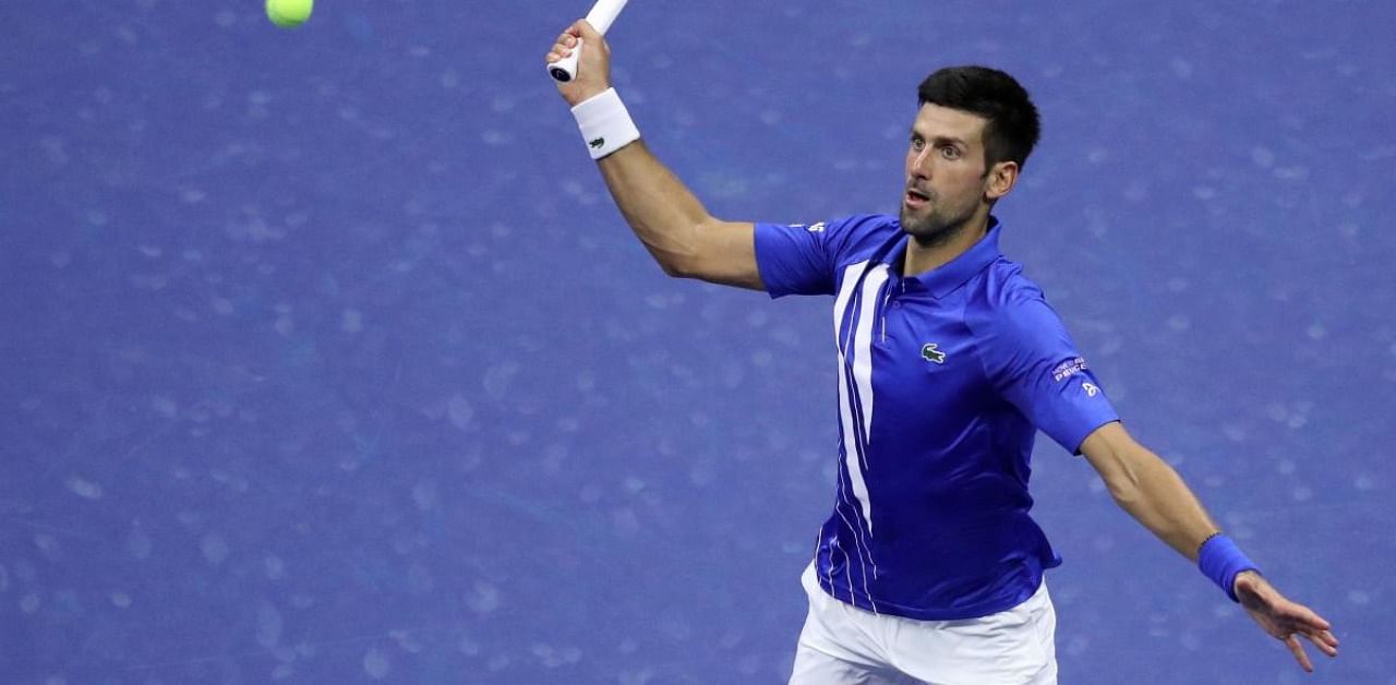 Novak Djokovic of Serbia returns a volley during the US Open. Credits: AFP