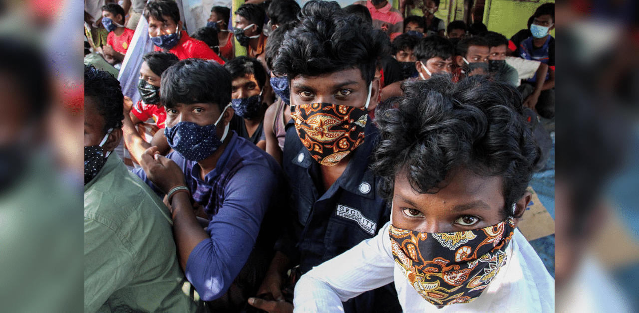 Rohingya refugees wearing protective face masks are pictured in Lhokseumawe, Aceh province, Indonesia September 7, 2020. Credit: Reuters Photo