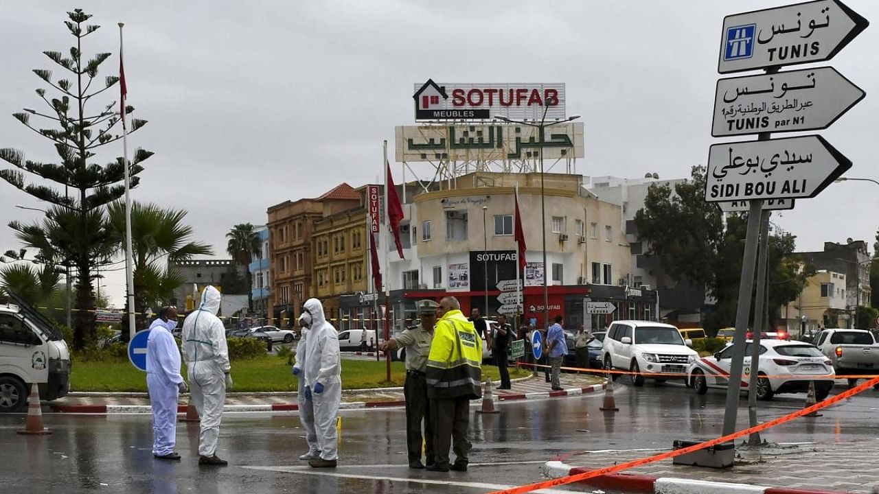 Tunisian forensic police investigate the site of an attack on Tunisian National Guard officers on September 6, 2020, in Sousse, south of the capital Tunis. Credit: AFP