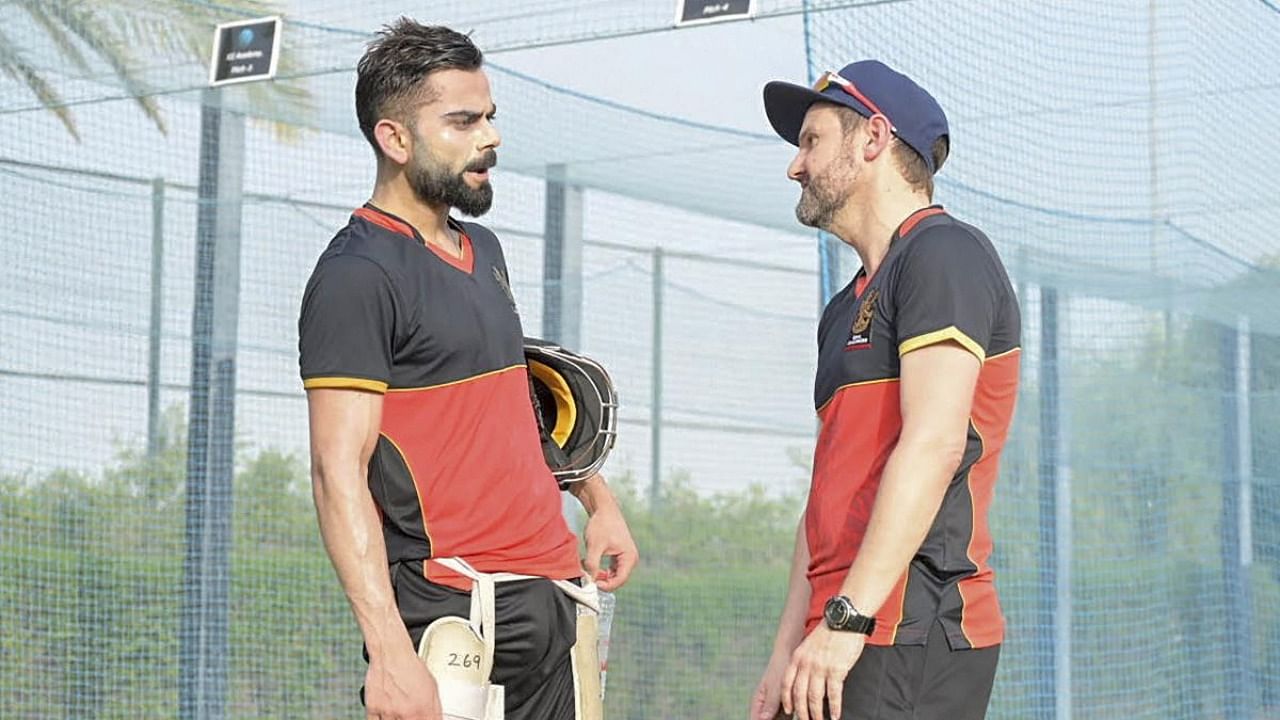 Royal Challengers Bangalore Captain Virat Kohli (L) during the team's first practice session for the impending 13th season of the Indian Premier League in Dubai. Credit: PTI