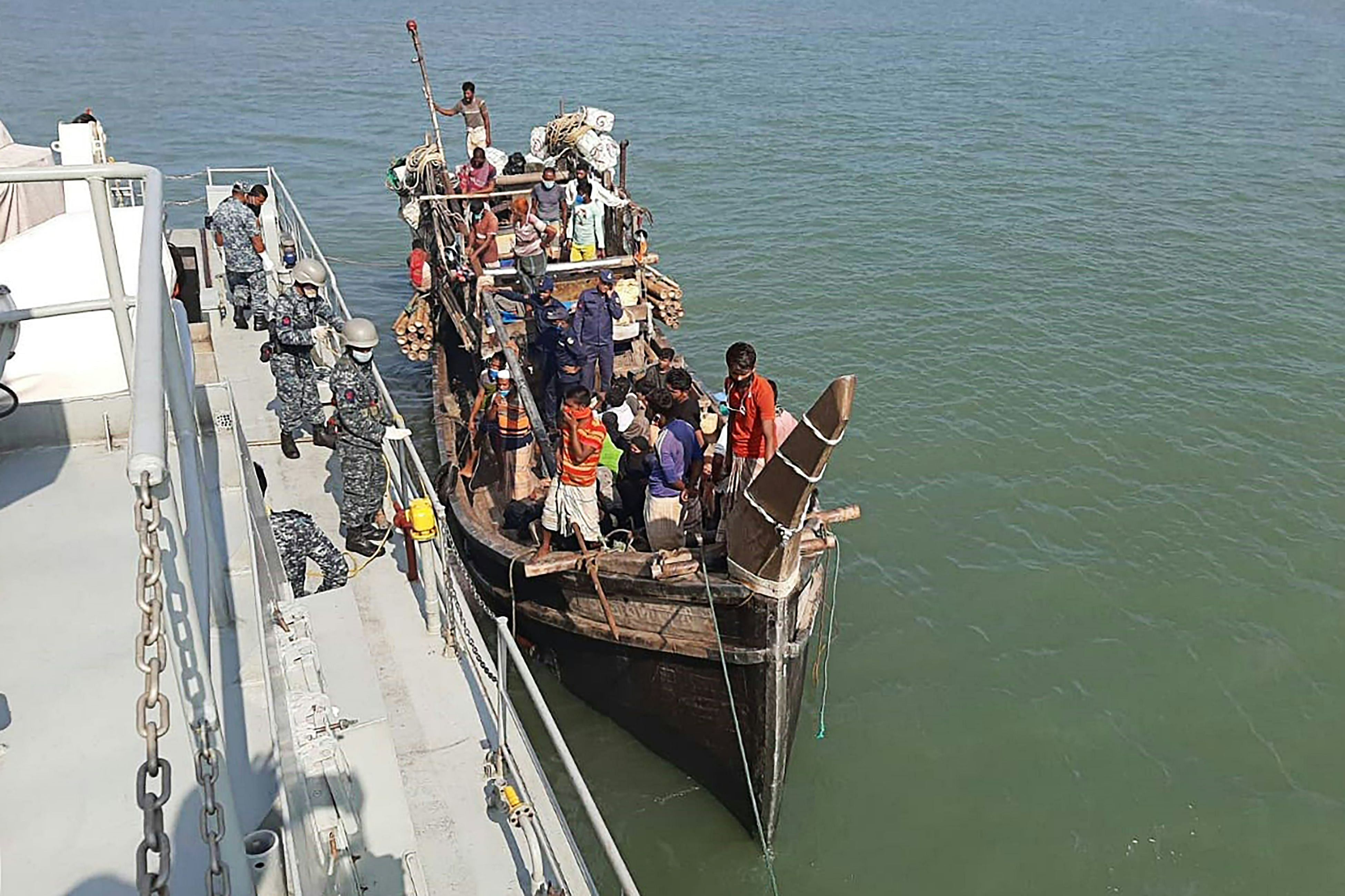 Rohingya refugees stranded at sea are seen on a boat near the coast of Cox's Bazar. Credit: AFP File Photo