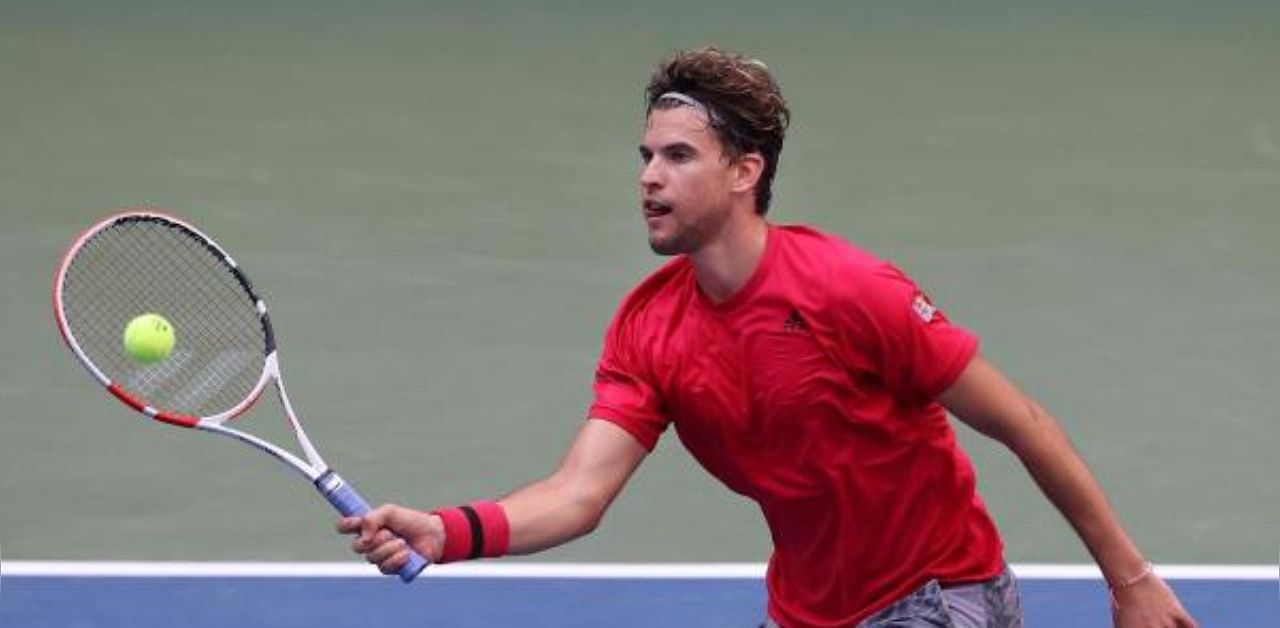 Dominic Thiem of Austria returns the ball during his Men's Singles fourth round match. Credit: AFP