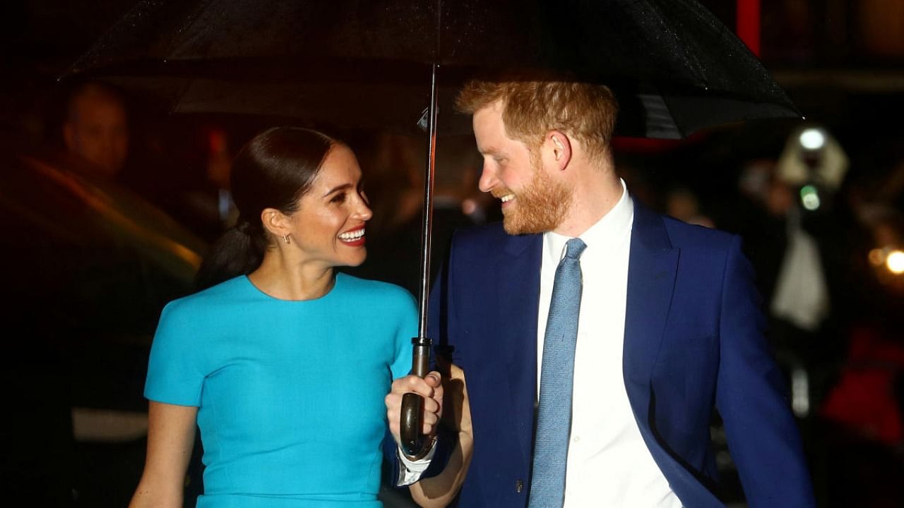 Harry with his wife Meghan. Credit: Reuters/file