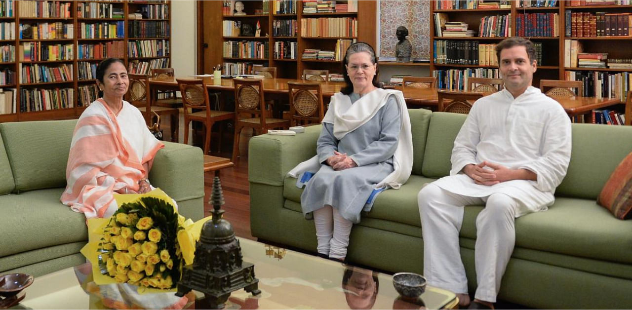 West Bengal Chief Minister and TMC chief Mamata Banerjee with Sonia Gandhi and Rahul Gandhi. Credit: PTI file photo
