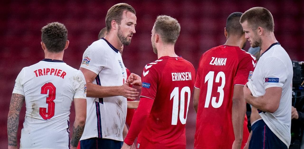 England's forward Harry Kane speaks with Denmark's midfielder Christian Eriksen after the UEFA Nations League football match. Credit: AFP