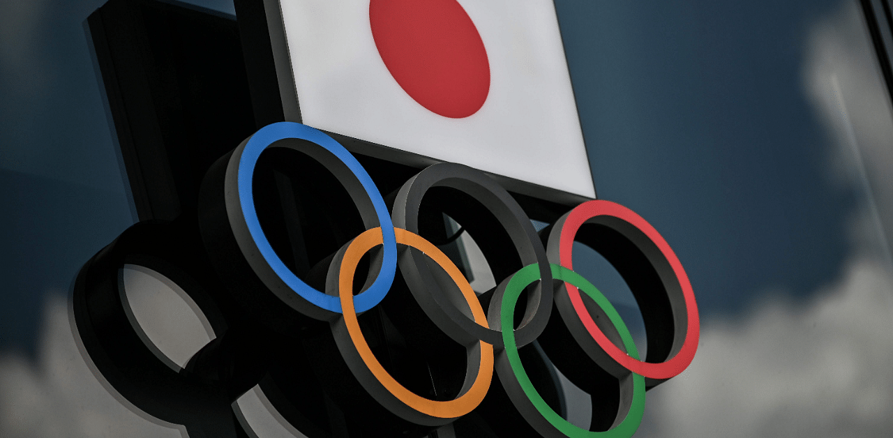 Olympic Rings and the Japanese flag. Credit: AFP Photo