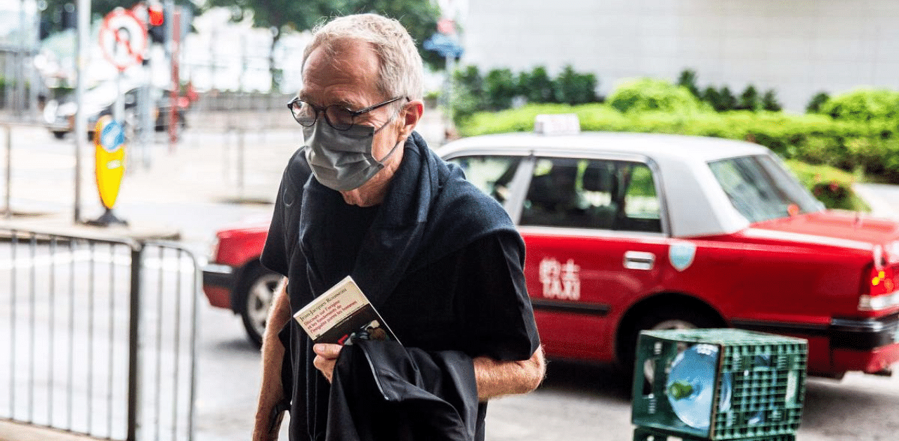 Photographer Marc Progin of Switzerland arrives at the Eastern Magistrates Court in Hong Kong September 9, 2020, where he faces a charge of aiding and abetting disorder in a public place steming from an incident in 2019. Credit: AFP Photo