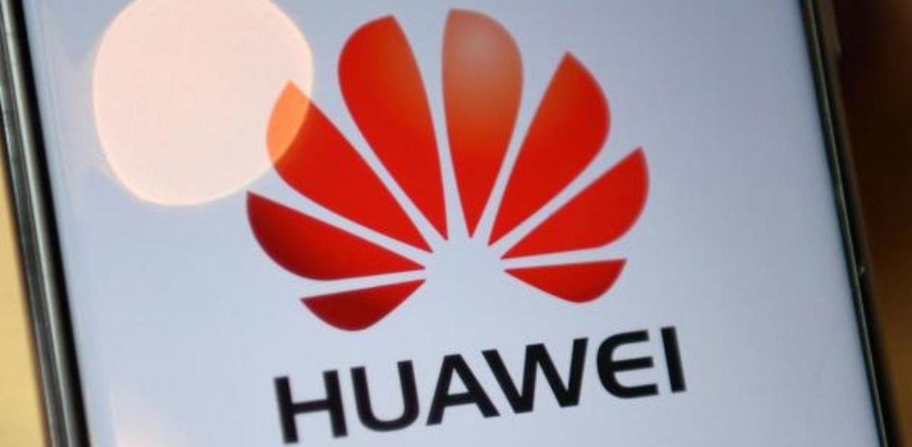 The logo of Chinese company Huawei is seen on the screen of a Huawei mobile phone. Credit: AFP