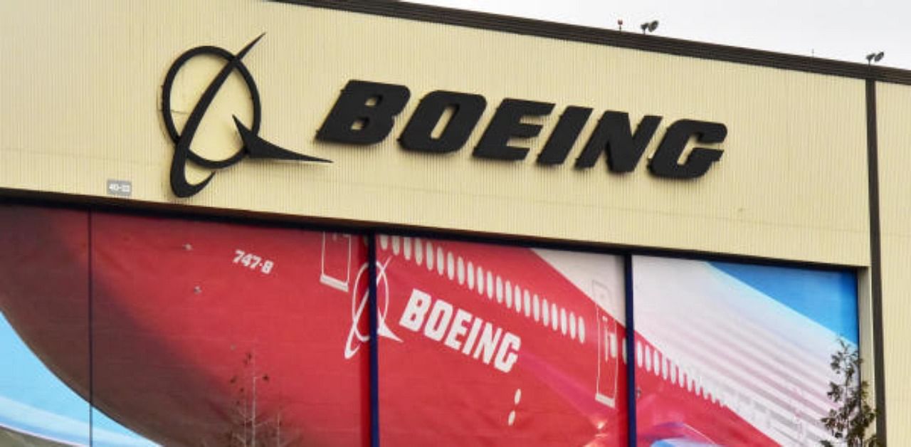 Boeing Co's logo is seen above the front doors of its largest jetliner factory in Everett, Washington. Credit: Reuters