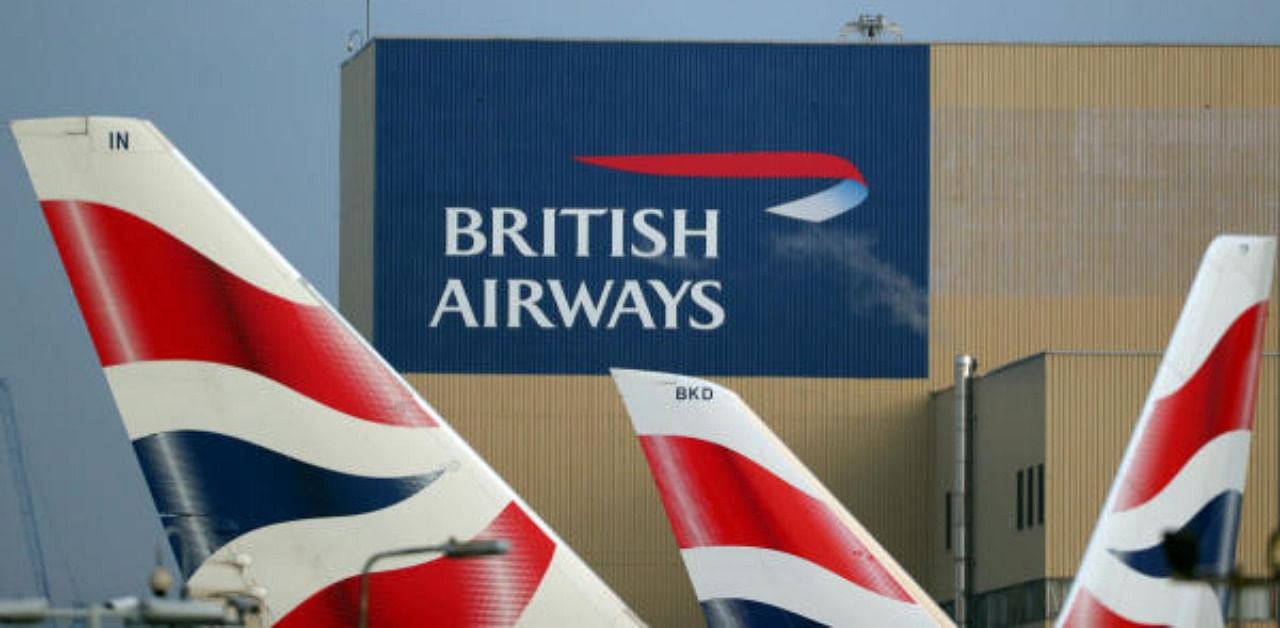 British Airways logos are seen on tail fins at Heathrow Airport. Credit: Reuters