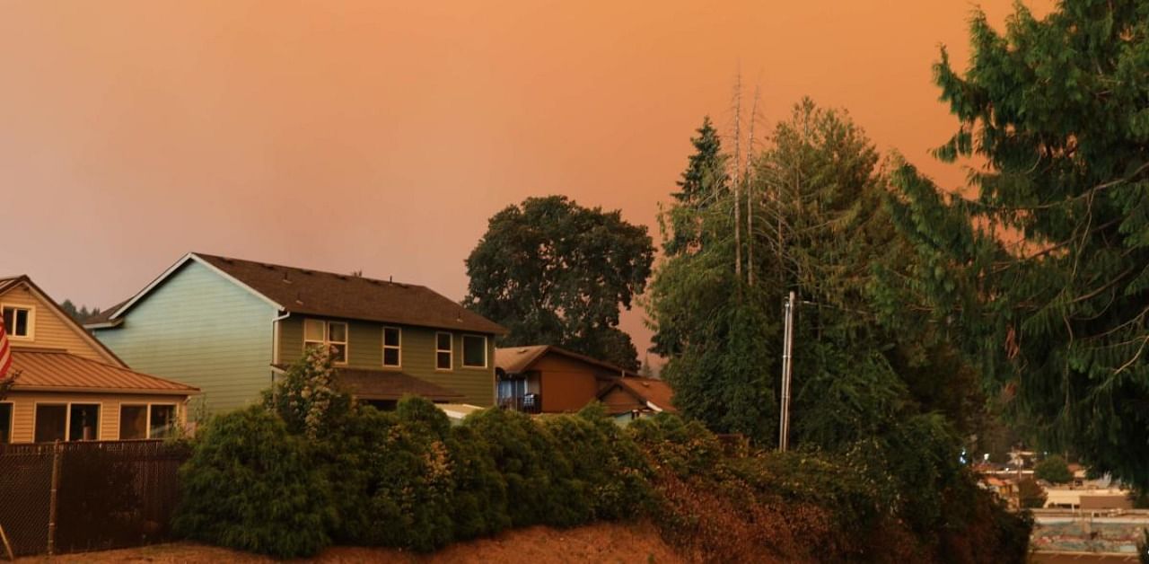 An orange smoke-filled sky is seen above Estacada, Oregon. Credit: AFP