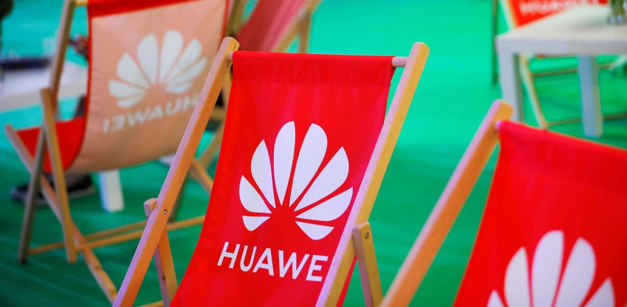 The Huawei logo is pictured on the company's stand. Credit: Reuters