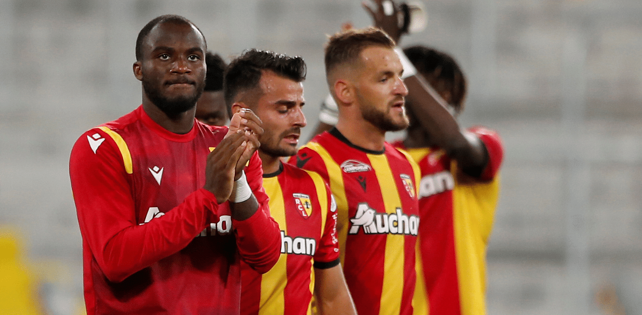 RC Lens' Ignatius Ganago and teammates celebrate after the match. Credit: Reuters Photo
