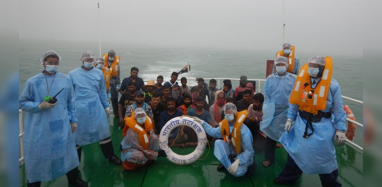 The rescued fishermen aboard ICG ship Kasturba Gandhi. Credit: DH Photo