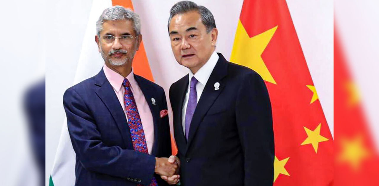 External Affairs Minister S Jaishankar shakes hands with Chinese State Councilor and Foreign Minister Wang Yi during a meeting at ASEAN Thailand 2019, in Bangkok, Thursday, Aug 1, 2019. The two leaders met on the sidelines of SCO in Moscow on Thursday, Sept. 10, 2020.The meeting between External Affairs Minister S Jaishankar and Chinese State Councilor & Foreign Minister Wang Yi concludes. Credit: Twitter/PTI Photo