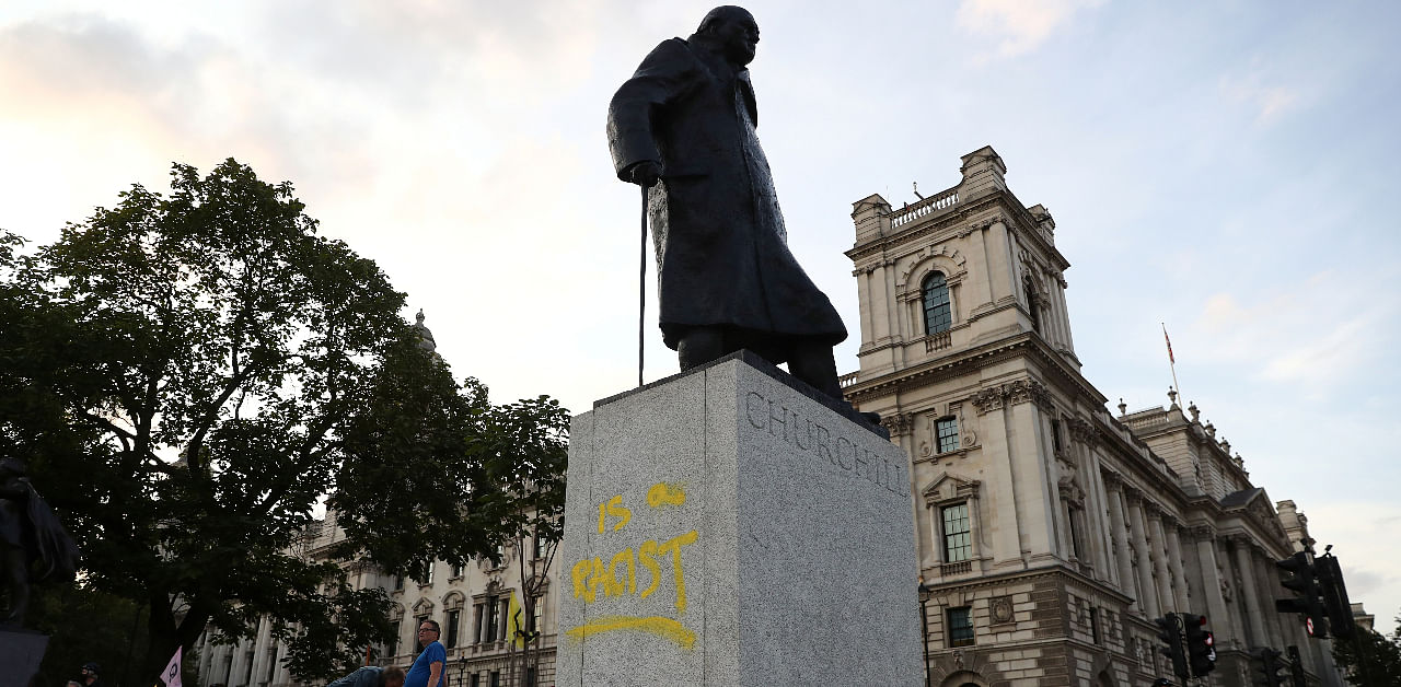 A graffiti is seen on the statue of Winston Churchill, in London, Britain September 10, 2020. Credit: REUTERS Photo