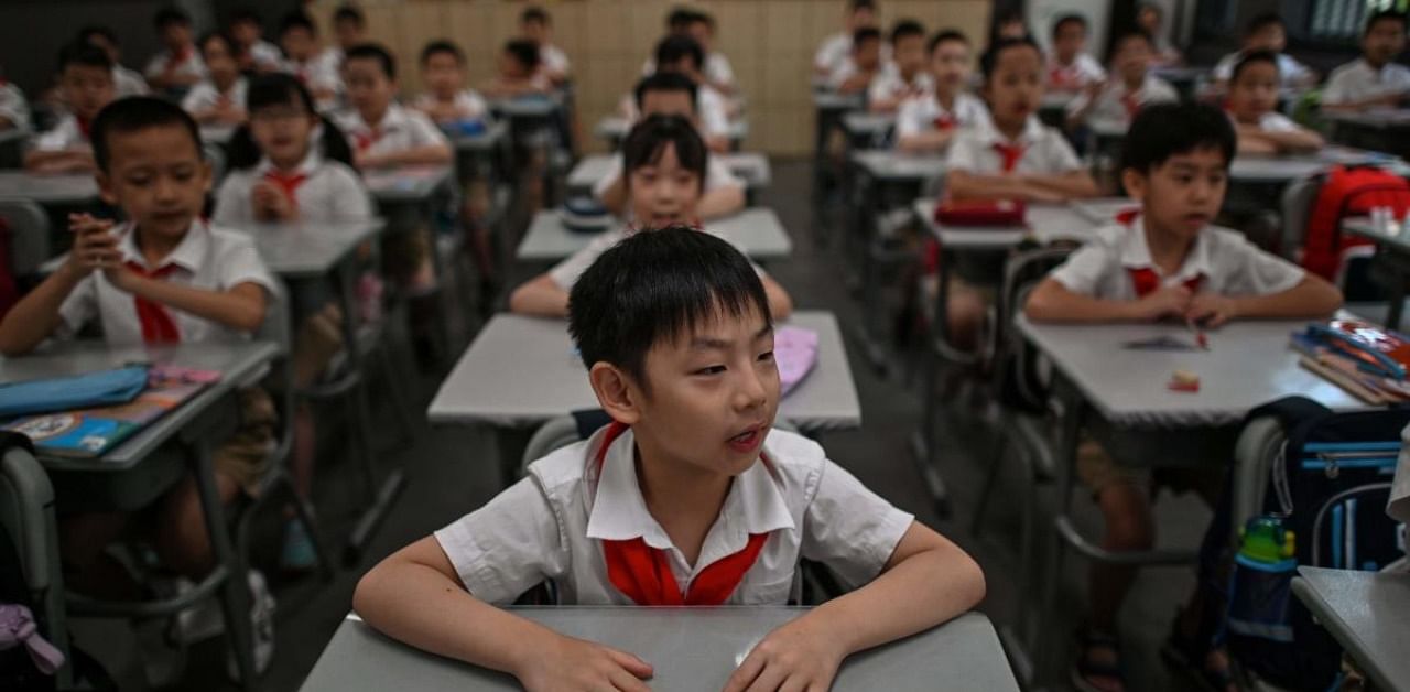 China resumes schools. Credit: AFP Photo