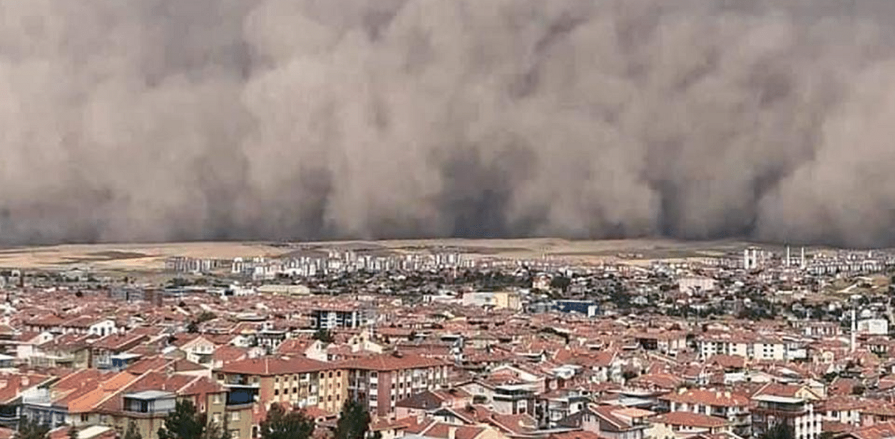 A handout TV grab made available by the Demiroren News Agency (DHA) on September 12, 2020, shows a freak sandstorm sweeping over Polatli, in Ankara, on September 12, 2020. Credit: AFP