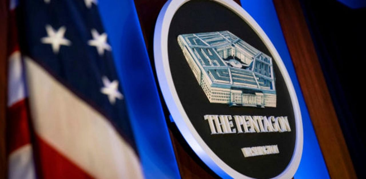 The Pentagon logo is seen behind the podium in the briefing room at the Pentagon in Arlington, Virginia, US. Credit: Reuters Photo