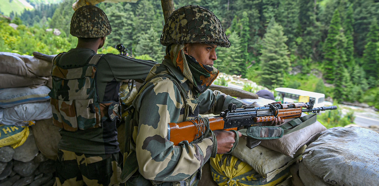 Indian soldiers near Line of Actual Control. Credit: PTI Photo