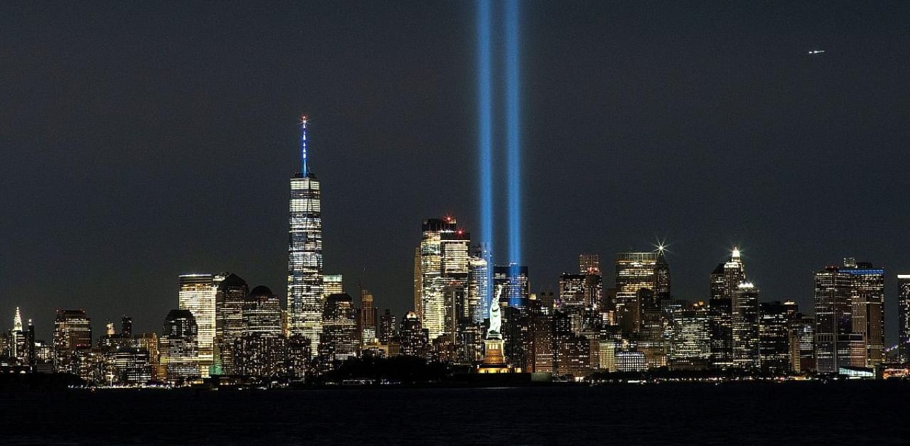 The Statue of Liberty and One World Trade Center are seen as the Tribute in Light shines in downtown Manhattan to commemorate the 19th anniversary of the September 11, 2001 attacks on the World Trade Center at the 9/11 Memorial & Museum in the Manhattan borough of New York City. Representative Photo. Credit: Reuters