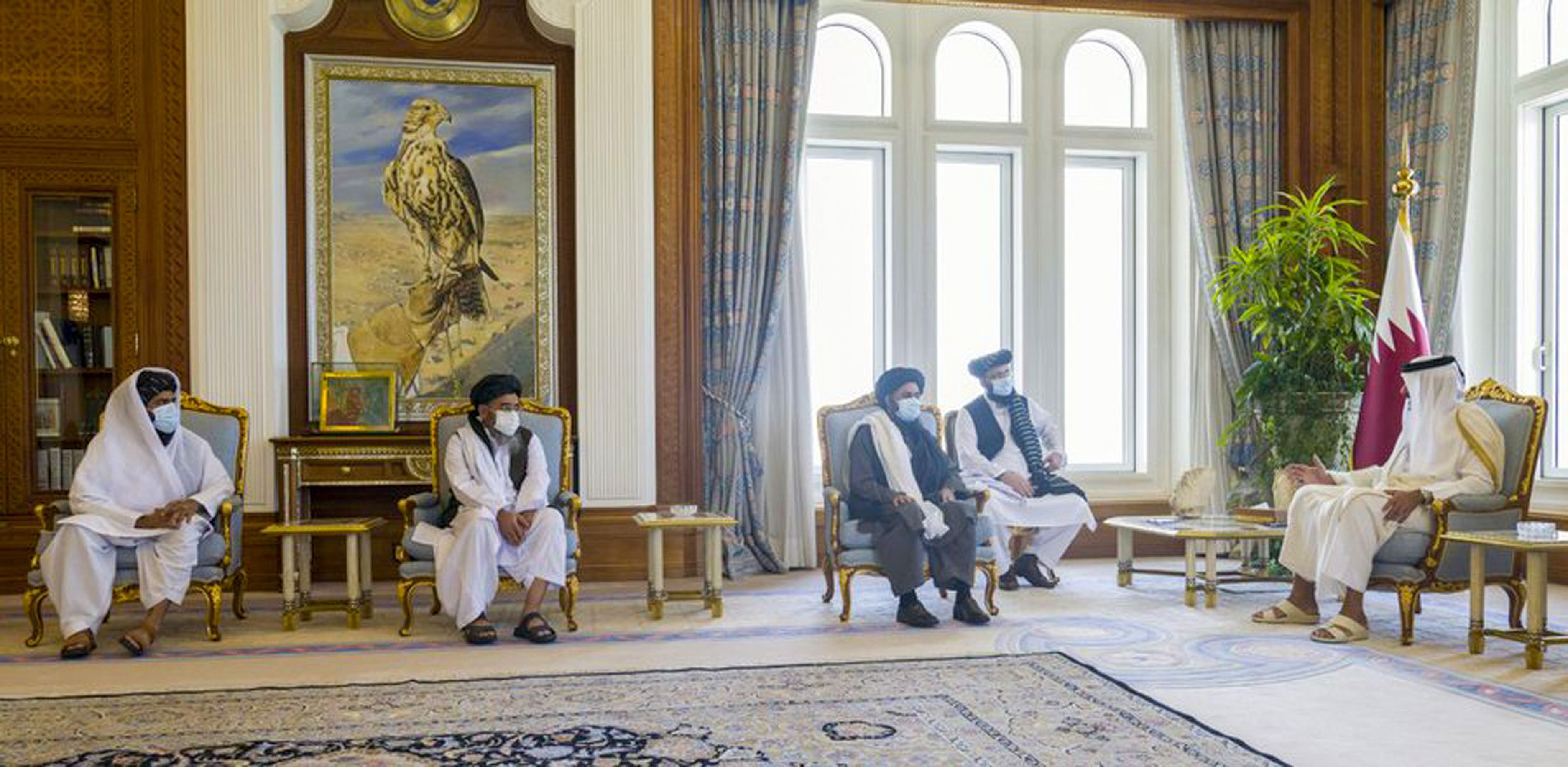 Qatar's Emir Sheikh Tamim bin Hamad al-Thani (R) meeting with Taliban co-founder Mullah Abdul Ghani Baradar (2nd-R) in the capital Doha. Credits: AFP Photo