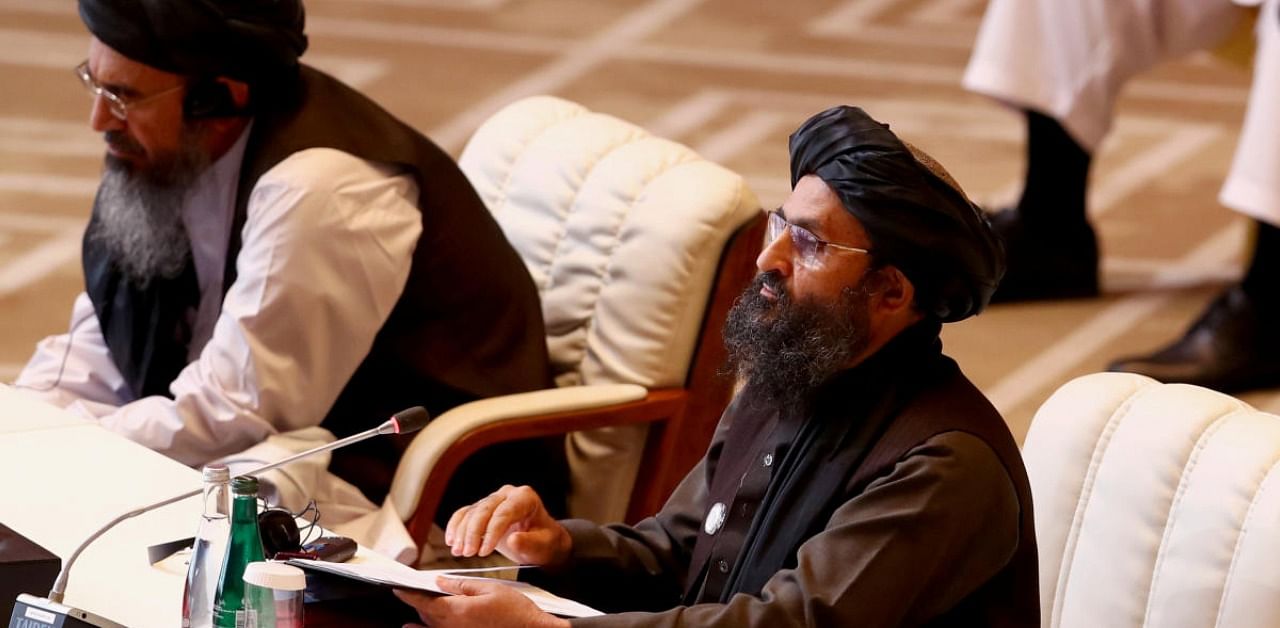 Mullah Abdul Ghani Baradar, the leader of the Taliban delegation, speaks during talks between the Afghan government and Taliban insurgents in Doha, Qatar. Credit: Reuters