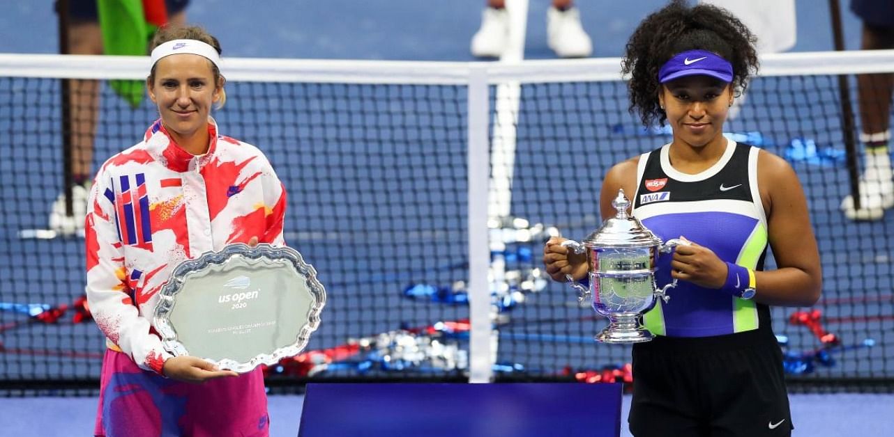 Victoria Azarenka (L) of Belarus holds the finalist trophy after their Women's Singles final match on Day Thirteen of the 2020 US Open. Credit: AFP
