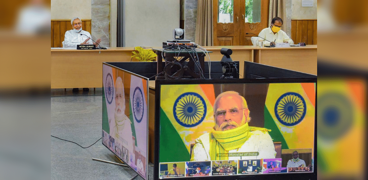 Bihar CM Nitish Kumar interacts with Prime Minister Narendra Modi during the launch of PMMSY and a series of development projects for Bihar via video conferencing, in Patna, Thursday, Sept. 10, 2020. Credit: PTI Photo