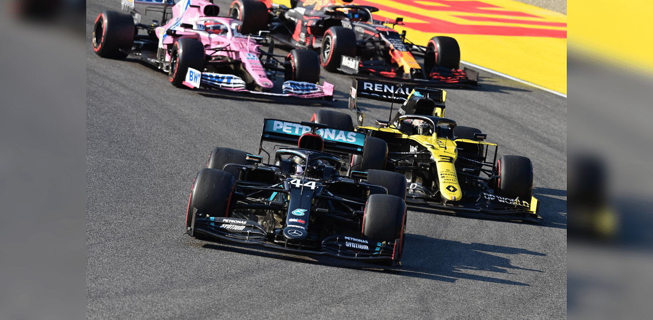 Mercedes' Lewis Hamilton and Renault's Daniel Ricciardo in action during the race. Credit: Reuters Photo