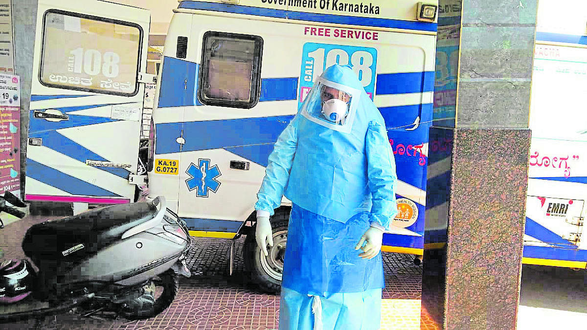 A special Covid ambulance driver with Personal Protective Equipment.