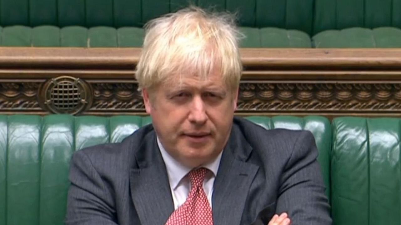 A video grab from footage broadcast by the UK Parliament's Parliamentary Recording Unit (PRU) shows Britain's Prime Minister Boris Johnson listening as Britain's main opposition Labour Party Shadow Business, Energy and Industrial Strategy Secretary Ed Miliband (unseen) speaks in the debate into the Government's proposed Internal Markets Bill. Credit: AFP/PRU