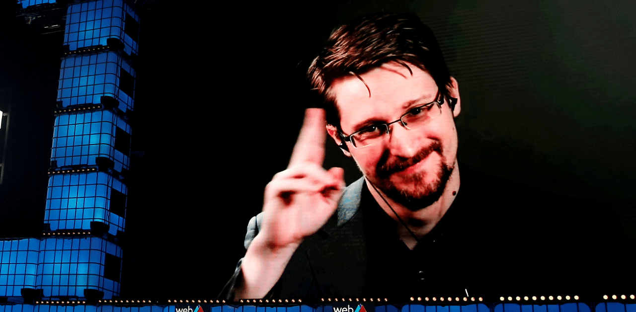 Edward Snowden gestures as he speaks via livestream at Web Summit in Lisbon, Portugal. Credit: Reuters Photo