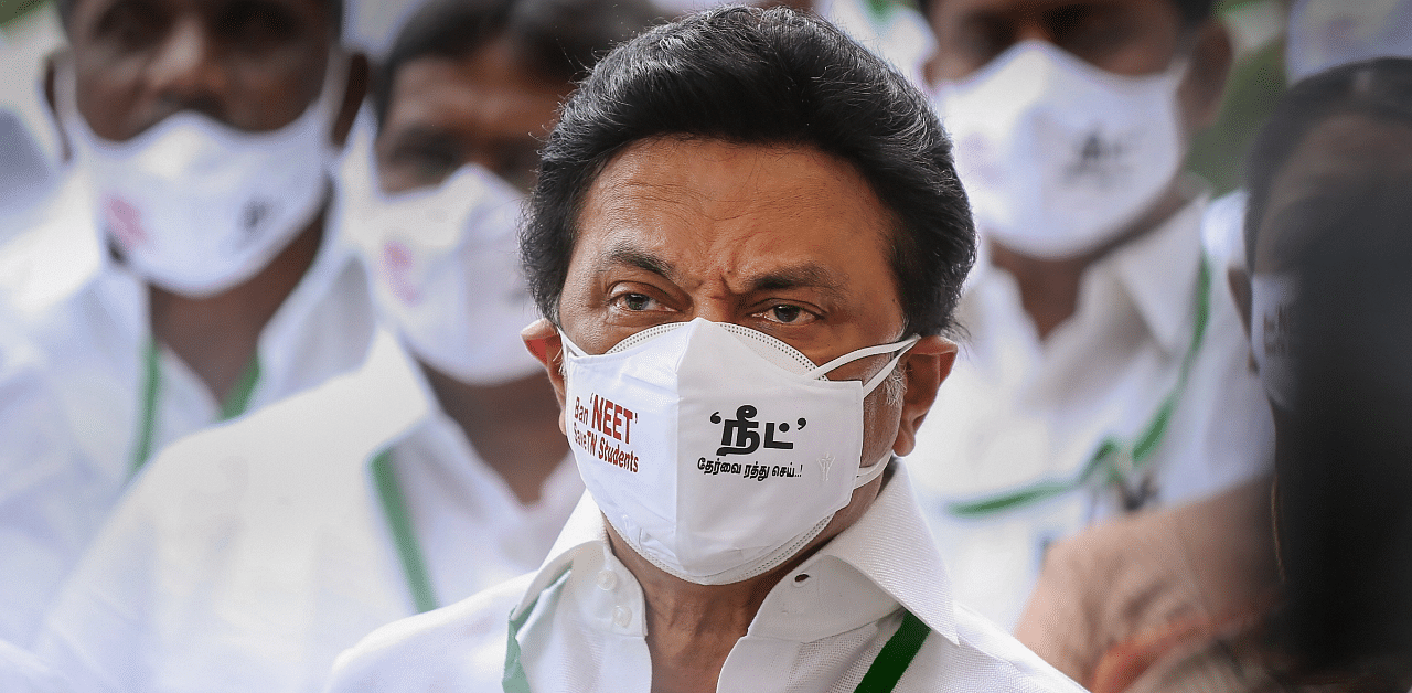 DMK President MK Stalin wearing a face mask with slogan 'Ban NEET, Save TN Students' arrives to attend Tamil Nadu Assembly Session, in Chennai. Credit: PTI Photo