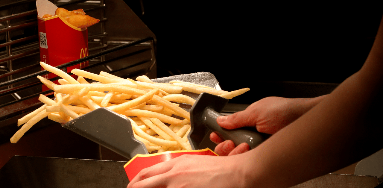 An employee cooks French fries at a McDonald's restaurant in Moscow, Russia. Credit: Reuters Photo