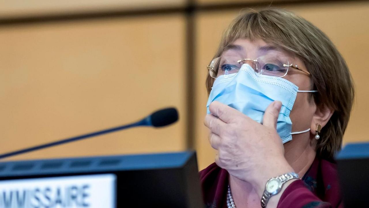 High Commissioner for Human Rights Michelle Bachelet adjusts her face mask as she attends the opening of the 45th session of the Human Rights Council, at the European headquarters of the United Nations in Geneva. Credit: AFP
