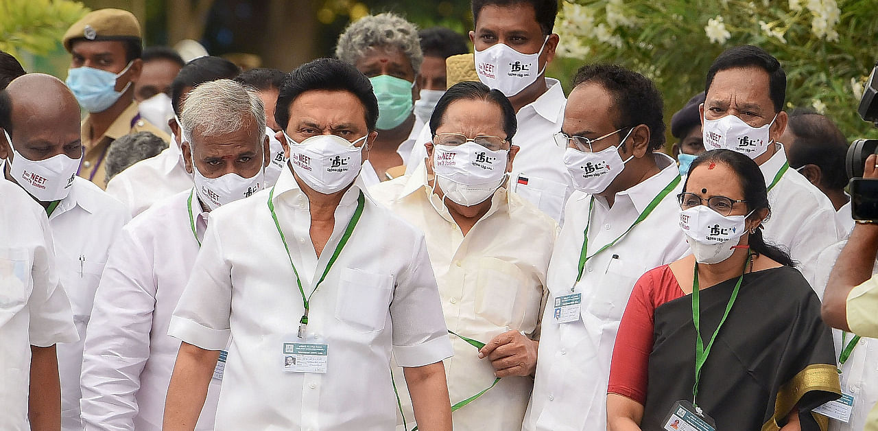 DMK President MK Stalin and his party MLAs wear face masks with 'Ban NEET, Save TN Students'written on it as they arrive to attend Tamil Nadu Assembly Session. Credit: PTI Photo