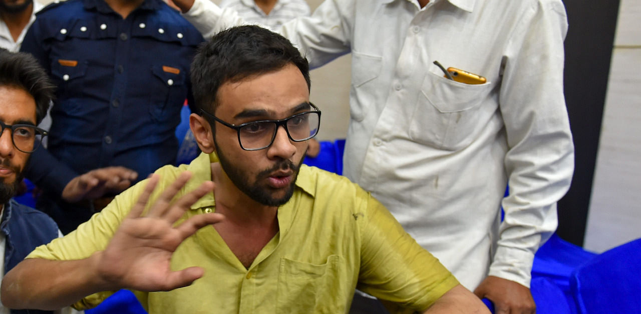 Former Jawaharlal Nehru University (JNU) student Umar Khalid speaks to the media moments after he was shot at, during an event at the Constitution Club in New Delhi. Credit: PTI Photo